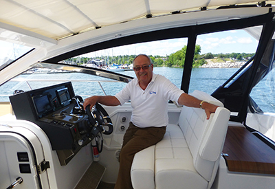 Cruisers Yachts 390 Express Coupe with John Armstrong at the helm
